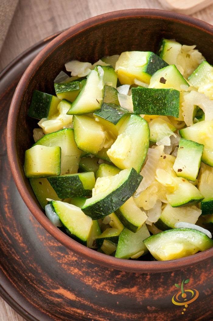 Fresh green summer squash with marrow-shaped seeds from SeedsNow, ready for cooking or gardening.
