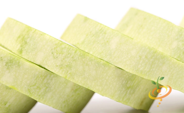 Fresh white seeds for summer marrow squash, shown in a clear image highlighting the seed texture and packaging.